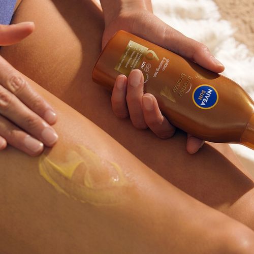 NIVEA SUN Karotenowy balsam do opalania + Przedłużający opaleniznę na Arena.pl