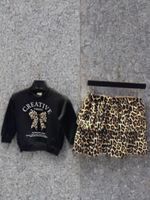 Komplet w panterkę bluza+ spódnica r.128