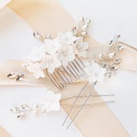 Komplet kwiatowych ozdób z kryształkami kwiatami listkami ślub BOHO