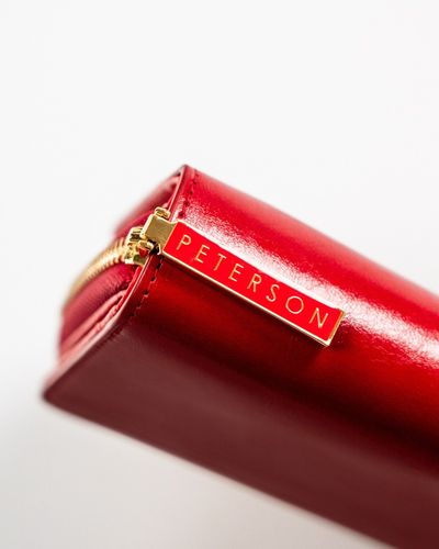 kompaktowy portfel damski ze skóry naturalnej w odcieniu krwistej na Arena.pl