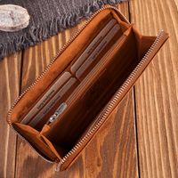 portfel damski skórzany pomarańczowy w geometryczny wzór