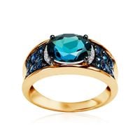 dostojny złoty pierścionek z topazem i szafirami