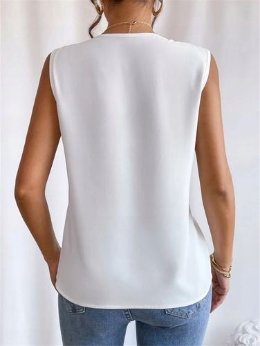 Elegancka damska biała bluzka z dekoltem w literę V bez rękawków na Arena.pl