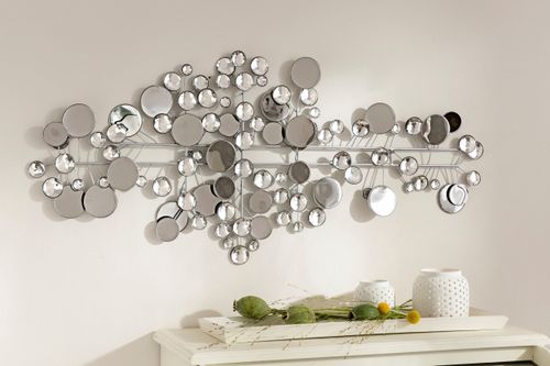 Interesująca dekoracja ścienna z elementami lustrzanymi na Arena.pl