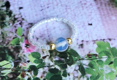 ELASTYCZNY PIERŚCIONEK KORALIKI OPAL na Arena.pl