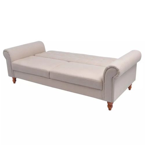 Sofa z kremowego materiału na Arena.pl