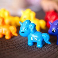 FIGURKI MONTESSORI JEDNOROŻCE EDUKACYJNE NAUKA GRA DO SKŁADANIA WOOPIE