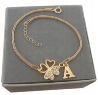 Złota bransoletka koniczynka LITERKA kr.Swarovski