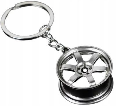 Brylok breloczek samochodowy Alufelga Srebrna NFS Alusy Chromowana Felga na Arena.pl