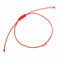 Bransoletka złota na sznurku kuleczka złoto 585