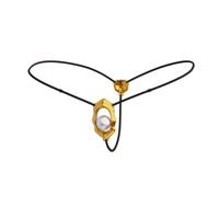 moist eyes g-string clitoral jewelry with bead stimulator upko
