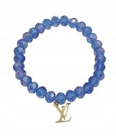 Bransoletka z niebieskich koralików z zawieszką VL w kolorze złotym