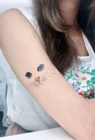 Tatuaż tattoo kocie oko na ramię jakość Paperself