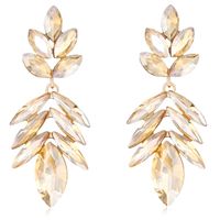 Wiszące kolczyki igły listki jodełka łezki szampańskie złote błysk KOKONET 3-0380