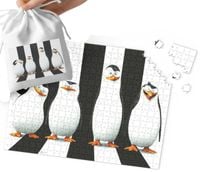 PUZZLE - Pingwiny z Madagaskaru WZORY Z BAJEK PREZENT 35el + WORECZEK