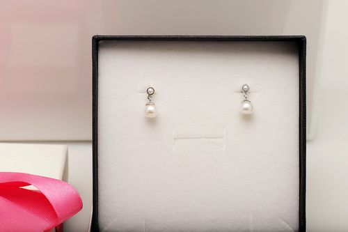 Srebrne kolczyki Staviori z perłami na Arena.pl