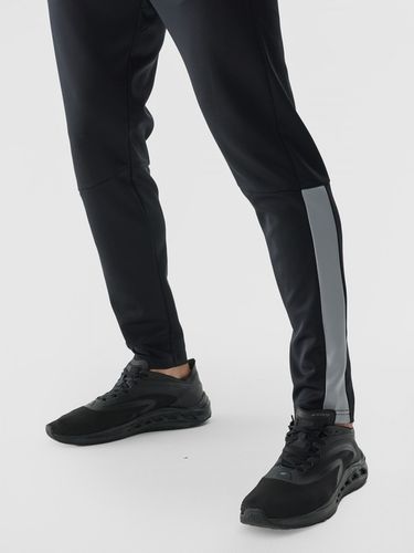 Męskie spodnie treningowe 4F 4FWAW24TFTRM683 - czarne na Arena.pl