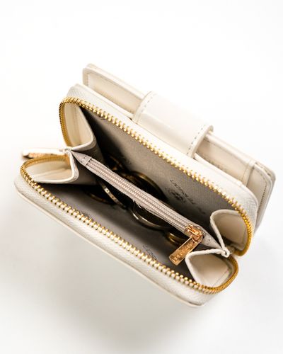 mały portfel damski ze skóry ekologicznej na zatrzask i suwak - peterson na Arena.pl