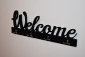 Wieszak drewniany z napisem Welcome