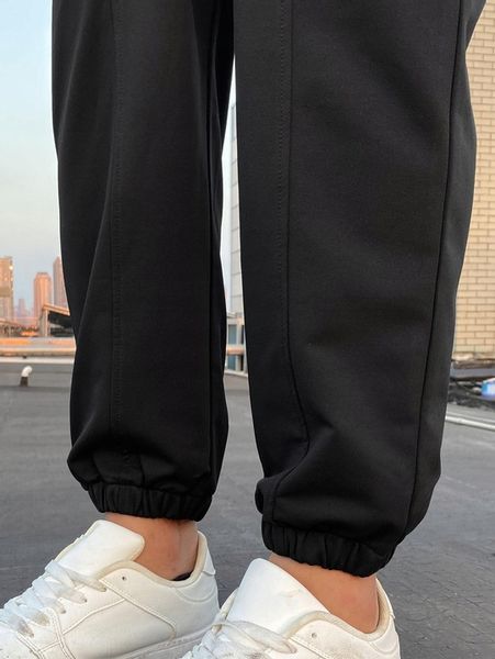 CZARNE SPODNIE DRESOWE JOGGERY KLASYCZNE GŁADKIE GUZIKI SHEIN S zdjęcie 4