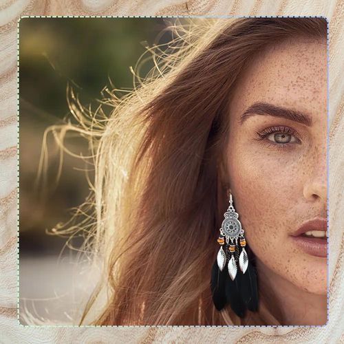 Kolczyki etniczne długie boho wiszące pióra czarne na Arena.pl