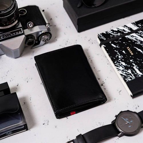 Pionowy portfel męski ze skóry naturalnej na Arena.pl