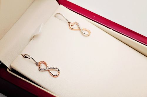 Złote kolczyki E3982P - Diament na Arena.pl