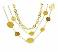 naszyjnik z wielu łańcuszków z monetkami