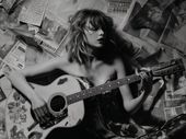 Plakat 40x30cm Młoda Gitarzystka