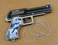 pistolet na gumki z kolorowym drukiem  20 cm.   -  p1254