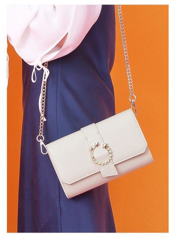 Duża kopertówka ecru na Arena.pl