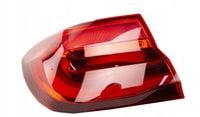 OE BMW LAMPA TYLNA W BŁOTNIK LEWY BMW 7 G11 G12 63217342963