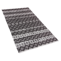 Dywan skórzany 80 x 150 cm czarny z beżowym FEHIMLI