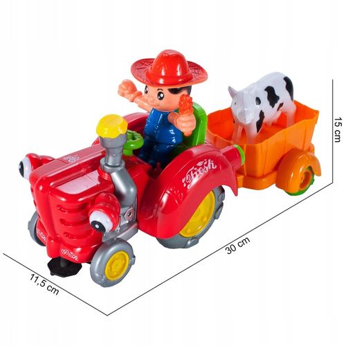 TRAKTOR TRAKTOREK FARMERA Z PRZYCZEPKĄ INTERAKTYWNY JEŹDZI ŚPIEWA KRÓWKA na Arena.pl