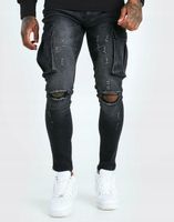 SPODNIE JEANSOWE BOJÓWKI Z DZIURAMI SUPER SKINNY CZARNE BOOHOO S