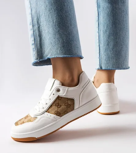 Białe sneakersy zdobione monogramem Isidora 41 na Arena.pl