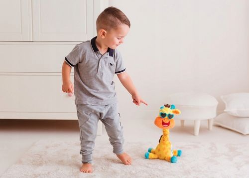 DUMEL TAŃCZĄCA ŻYRAFA ALEK INTERAKTYWNA ZABAWKA kręci szyją świeci MELODIE na Arena.pl