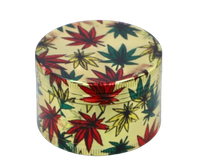 Złoty Crusher Młynek do Tytoniu Grinder Metalowy z Zielonymi Listkami