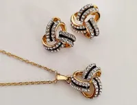 Złoty komplet biżuterii pozłacane precelki cyrkonie na prezent