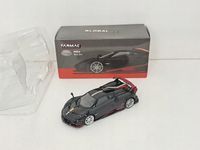 TARMAC PAGANI IMOLA Nero oro MiJo Version 1:64