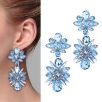 Długie wiszące pozłacane kolczyki z kryształkami niebieska kolorystyka GLAM