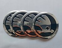 Naklejki emblemat na kołpaki dekielki koła skoda 56 mm aluminium 4 szt NOWE