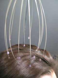 Masażer głowy na Arena.pl