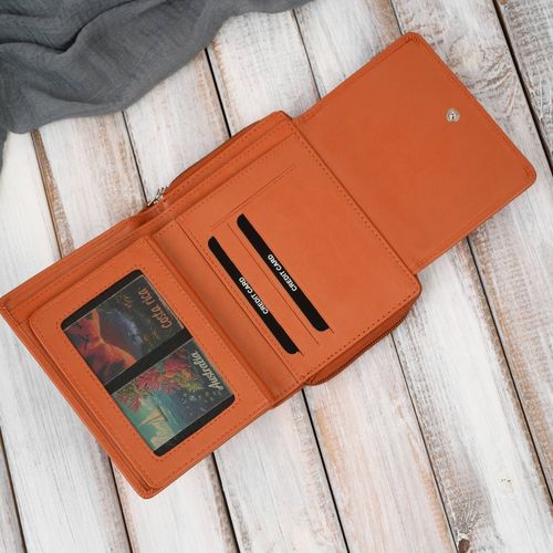 portfel damski skórzany pomarańczowy duży w orientacji poziomej na Arena.pl
