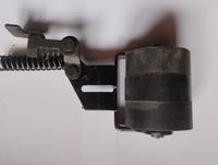 Naciąg z rolką szlifierki taśmowej