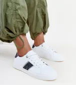Biało-czarne sneakersy z ozdobnym paskiem Grada 37