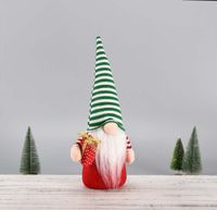 Dekoracja świąteczna ZIMOWA gnom w czapce z prezentem 38 cm BOŻE NARODZENIE