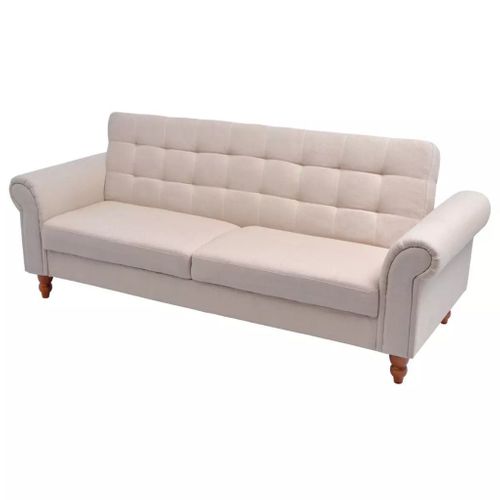 Sofa z kremowego materiału na Arena.pl