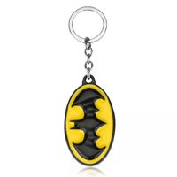Breloczek do kluczy Batman Początek Znak Logo Symbol Elipsa Reflektor Bruce