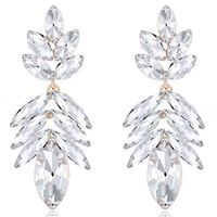 Wysmuklające kolczyki rozłożyste złote z cyrkoniami i listkami KOKONET 3-0383